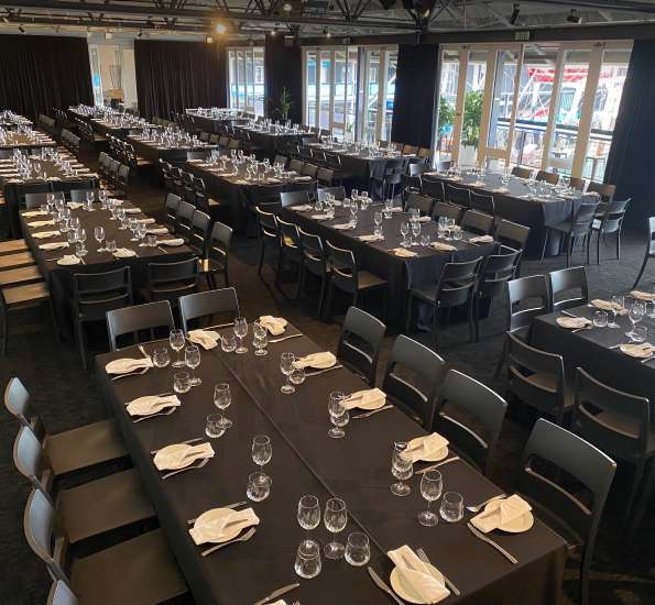 Spacious hall arranged for corporate event seating