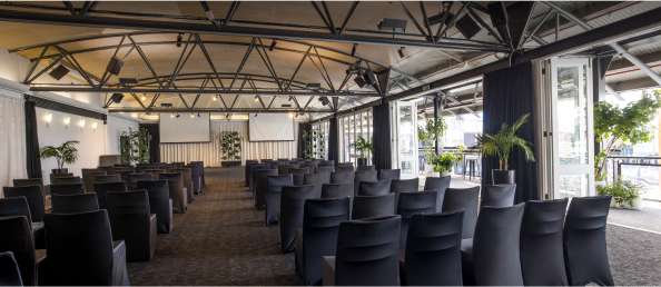 Conference room with presentation screen and seating